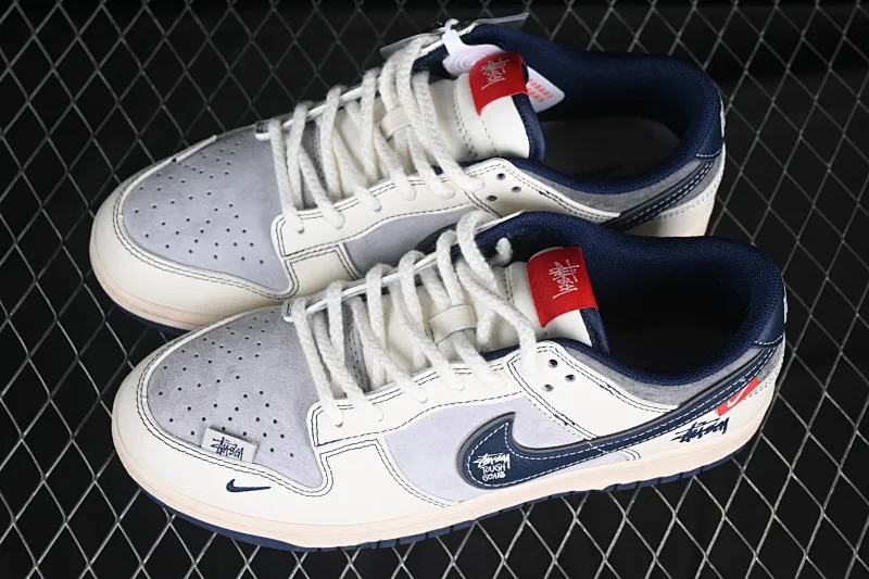 All categories Nk SB Dunk Series Nk SB Dunk Low High-end customized low-top sneakers Nk SB Dunk Low Stusi co-branded signature navy blue hook Anniversary high-end customized low-top casual sneakers DM6868-034